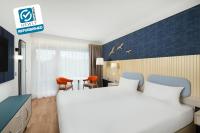 Posteľ alebo postele v izbe v ubytovaní Danubius Hotel Annabella