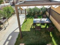 Zahrada ubytování Casa con terraza, A/A, barbacoa, wifi, parking a 500 m de la playa - ES-89-86