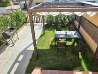 Zahrada ubytování Casa con terraza, A/A, barbacoa, wifi, parking a 500 m de la playa - ES-89-86