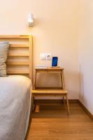Postel nebo postele na pokoji v ubytování Hills View Central Apartment