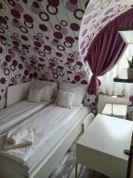 Posteľ alebo postele v izbe v ubytovaní Ede Apartman