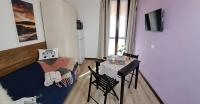 Televízia a/alebo spoločenská miestnosť v ubytovaní Bed & Breakfast Le Due G