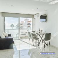 TV a/nebo společenská místnost v ubytování Nissi Avenue Suites