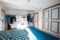 a bedroom with a bed and a closet at Appartement d&#39;une chambre avec vue sur la ville et wifi a Embrun in Embrun