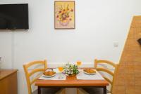 Telewizja i/lub zestaw kina domowego w obiekcie Apartments Silvana 74