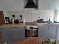 Kuchyňa alebo kuchynka v ubytovaní Homing Volos Inspired Modern Living