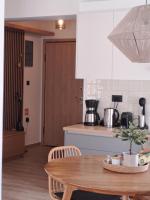 Kuchyňa alebo kuchynka v ubytovaní Homing Volos Inspired Modern Living