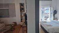 Posteľ alebo postele v izbe v ubytovaní Homing Volos Inspired Modern Living
