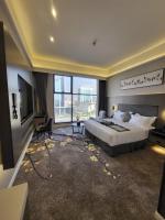 Msharef Almoden hotelにあるベッド
