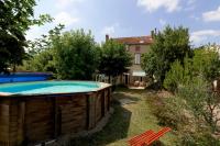 a pool in the backyard of a house at Chambres d&#39;Hôtes Villa Bellevue in Albi