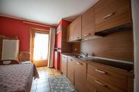 Kuchyňa alebo kuchynka v ubytovaní Appartamento Mokino Center Myholidaylivigno