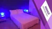 Ein Bett oder Betten in einem Zimmer der Unterkunft MAKAZI Haoutungu