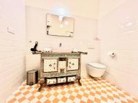 a bathroom with a sink and a toilet and a mirror at ApartHotel Riviera - CCC OT Loft du Chateau Old Town Prom des Anglais in Nice