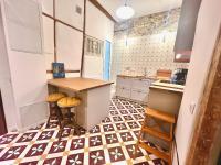 a kitchen with a checkered floor at ApartHotel Riviera - CCC OT Loft du Chateau Old Town Prom des Anglais in Nice