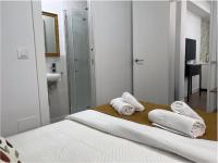 Posteľ alebo postele v izbe v ubytovaní APARTAMENTO URQUÍA