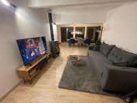 Biutiful Bungalowにあるテレビまたはエンターテインメントセンター
