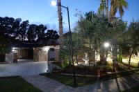 A garden outside Giardini Sausari Residence