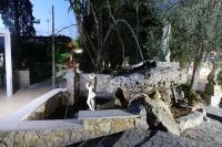 A garden outside Giardini Sausari Residence