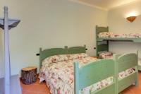 Posteľ alebo postele v izbe v ubytovaní Albergo Villa San Michele
