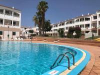 Bazén v ubytování Macarelleta Apartamento con piscina nebo v jeho okolí