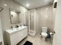 Koupelna v ubytování Macarelleta Apartamento con piscina