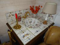 a table with a sink and a lamp on it at Le Clos Fleuri in Caumont