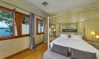Posteľ alebo postele v izbe v ubytovaní Villa Veneziano Suites & Villa
