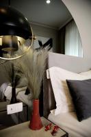 Łóżko lub łóżka w pokoju w obiekcie MINT Boutique Studio Apartments