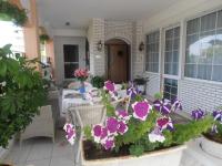 A garden outside Apartments Palladium