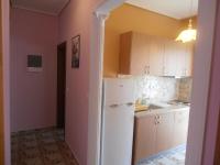 A kitchen or kitchenette at Apartments Palladium