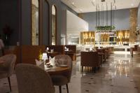 Veitingastaður eða matsölustaður á Cantonal Hotel by Warwick