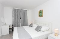 Posteľ alebo postele v izbe v ubytovaní Apartment Dupčić