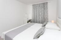 Posteľ alebo postele v izbe v ubytovaní Apartment Dupčić