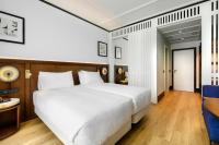 Posteľ alebo postele v izbe v ubytovaní Hotel Tres Reyes San Sebastián