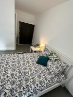Posteľ alebo postele v izbe v ubytovaní Apparemment lumineux (3 lits, 2 chambres, 1 salon) 2ème Arrondissement