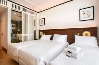 Posteľ alebo postele v izbe v ubytovaní Hotel Tres Reyes San Sebastián