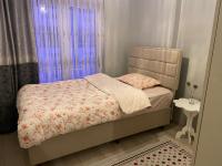 Postel nebo postele na pokoji v ubytování Şehir merkezinde lüx daire