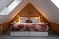 Hotel Majercaにあるベッド