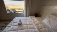 Postel nebo postele na pokoji v ubytování Pyramids Land Hotel