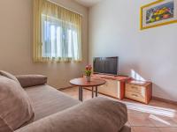 Televízia a/alebo spoločenská miestnosť v ubytovaní Apartment Rok 1 by Interhome