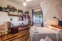Posteľ alebo postele v izbe v ubytovaní GOCCE VILLAS - Sunshine Villa