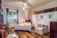 Posteľ alebo postele v izbe v ubytovaní GOCCE VILLAS - Sunshine Villa
