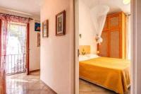 Posteľ alebo postele v izbe v ubytovaní GOCCE VILLAS - Sunshine Villa