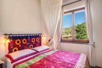 Posteľ alebo postele v izbe v ubytovaní GOCCE VILLAS - Sunshine Villa