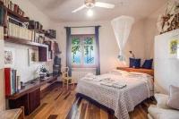 Posteľ alebo postele v izbe v ubytovaní GOCCE VILLAS - Sunshine Villa