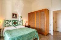 Posteľ alebo postele v izbe v ubytovaní GOCCE VILLAS - Sunshine Villa