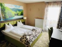 Posteľ alebo postele v izbe v ubytovaní Hotel Pruggererhof