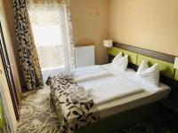 Posteľ alebo postele v izbe v ubytovaní Hotel Pruggererhof