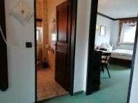 Posteľ alebo postele v izbe v ubytovaní Hotel garni Landhaus Bürtlmair