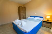 Posteľ alebo postele v izbe v ubytovaní Apartmani Malbašić